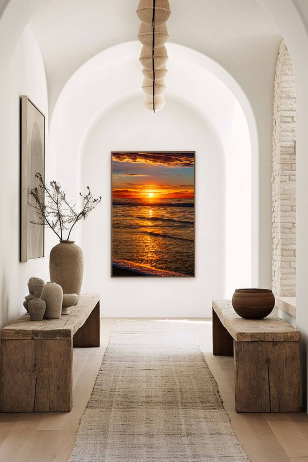 Tirage photo fine art coucher de soleil sur l’océan avec reflets dorés et ciel nuageux