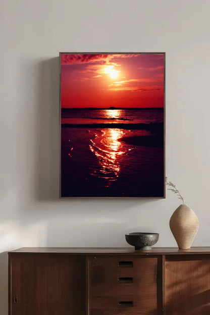 Tirage photo fine art coucher de soleil rouge au lac de Sanguinet avec reflets sur l'eau et cabane sur pilotis en silhouette